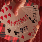 How Do You Show The Cards While Playing Rummy?